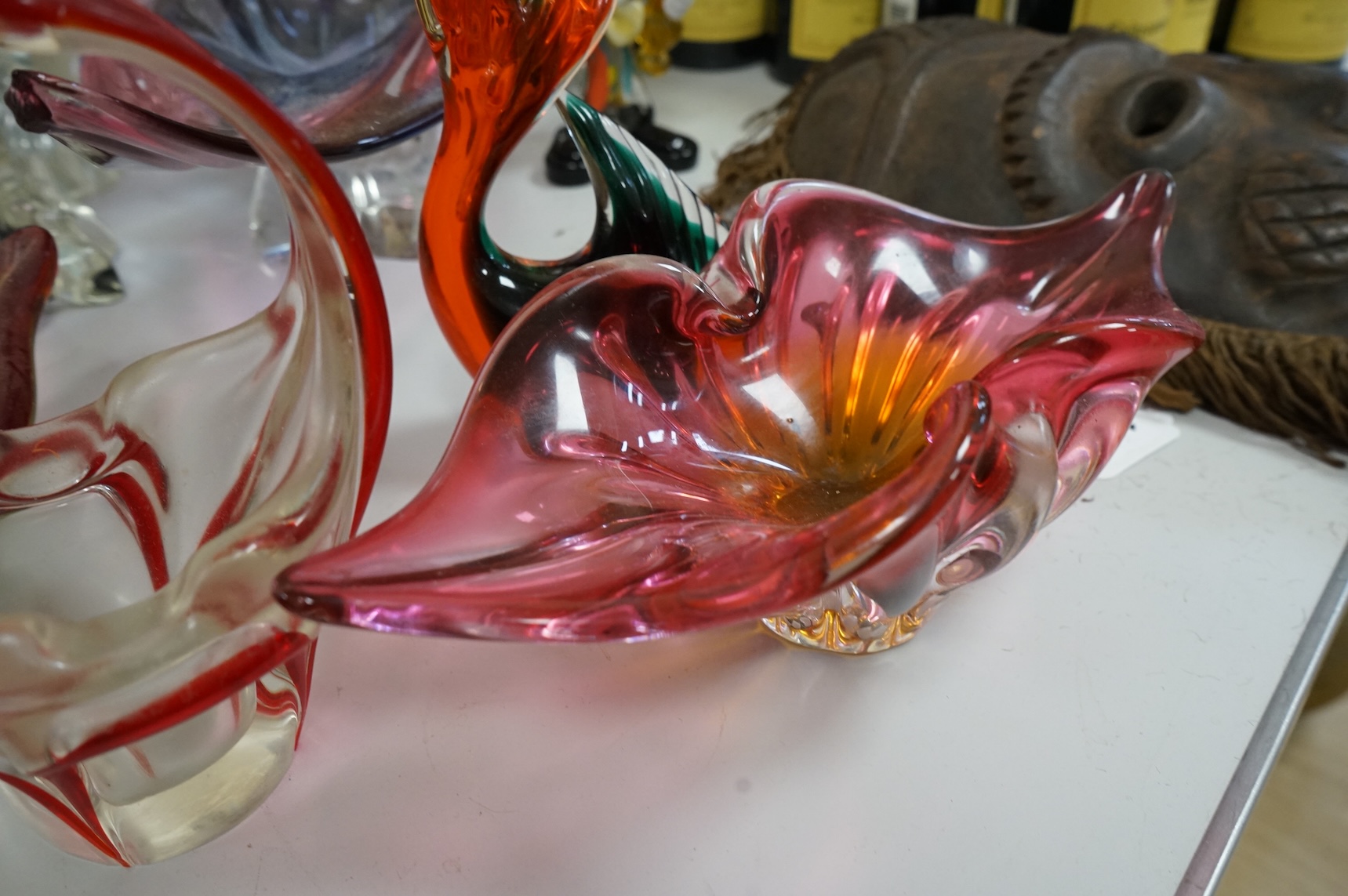 Two multi-coloured Murano glass clowns, a pair of 'fish' vases and modernist glassware, tallest 32cm